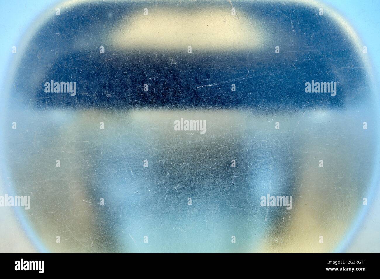 Texture di shabby e graffiato vetro smerigliato marciapiede luce lente. Foto Stock
