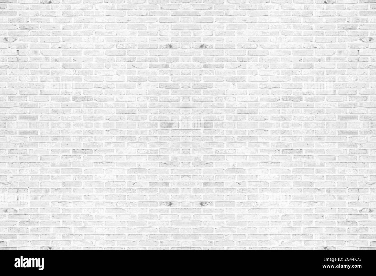 Abstract weathered texture colorate vecchio stucco grigio chiaro. In mattoni bianchi sullo sfondo di parete nella sala rurale. Texture di sfondo orizzontale. Foto Stock