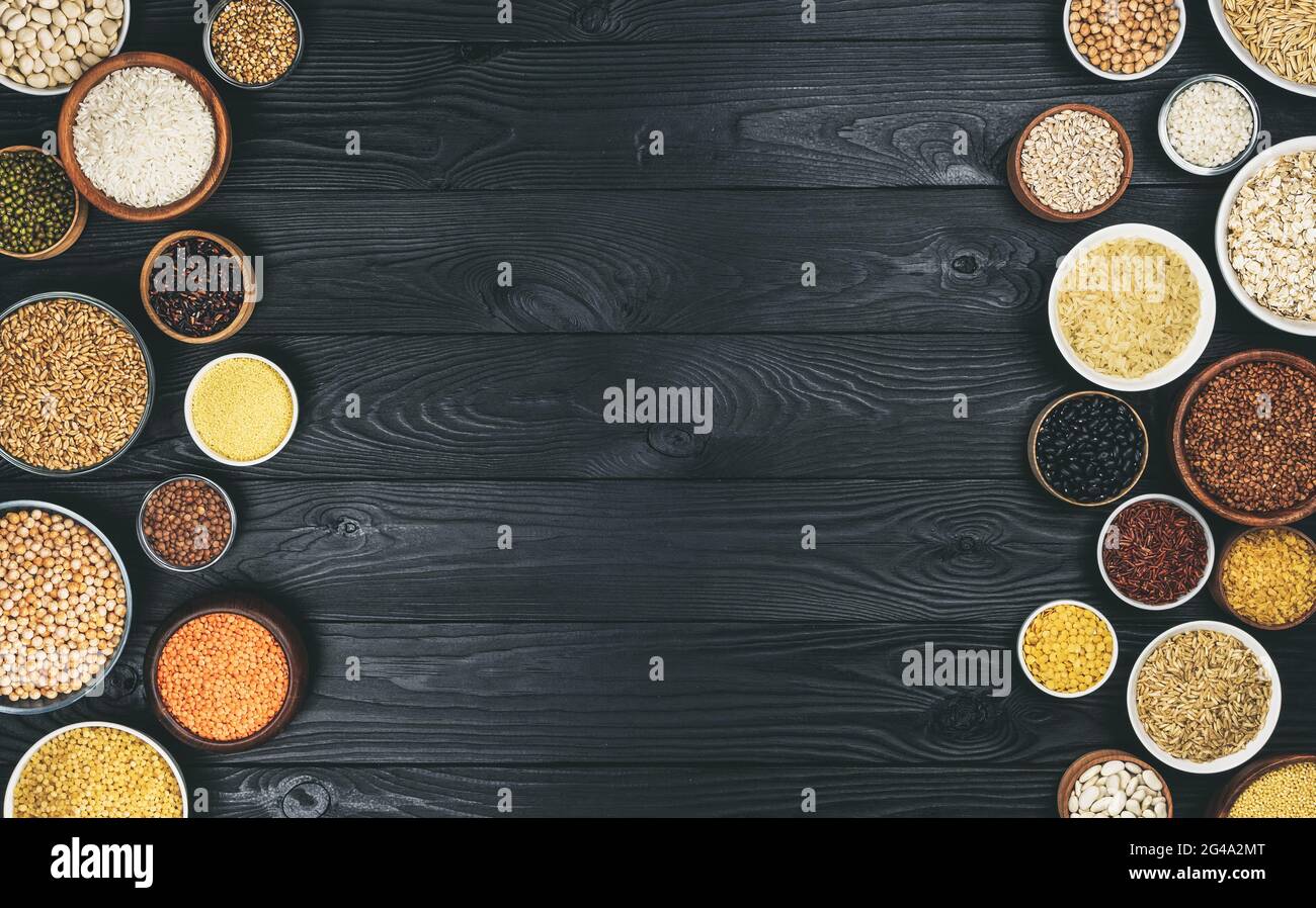 Vari Cereali, granaglie, semi, dieta ad alto contenuto di fibre concetto, photo filtrato in stile vintage, vista dall'alto Foto Stock