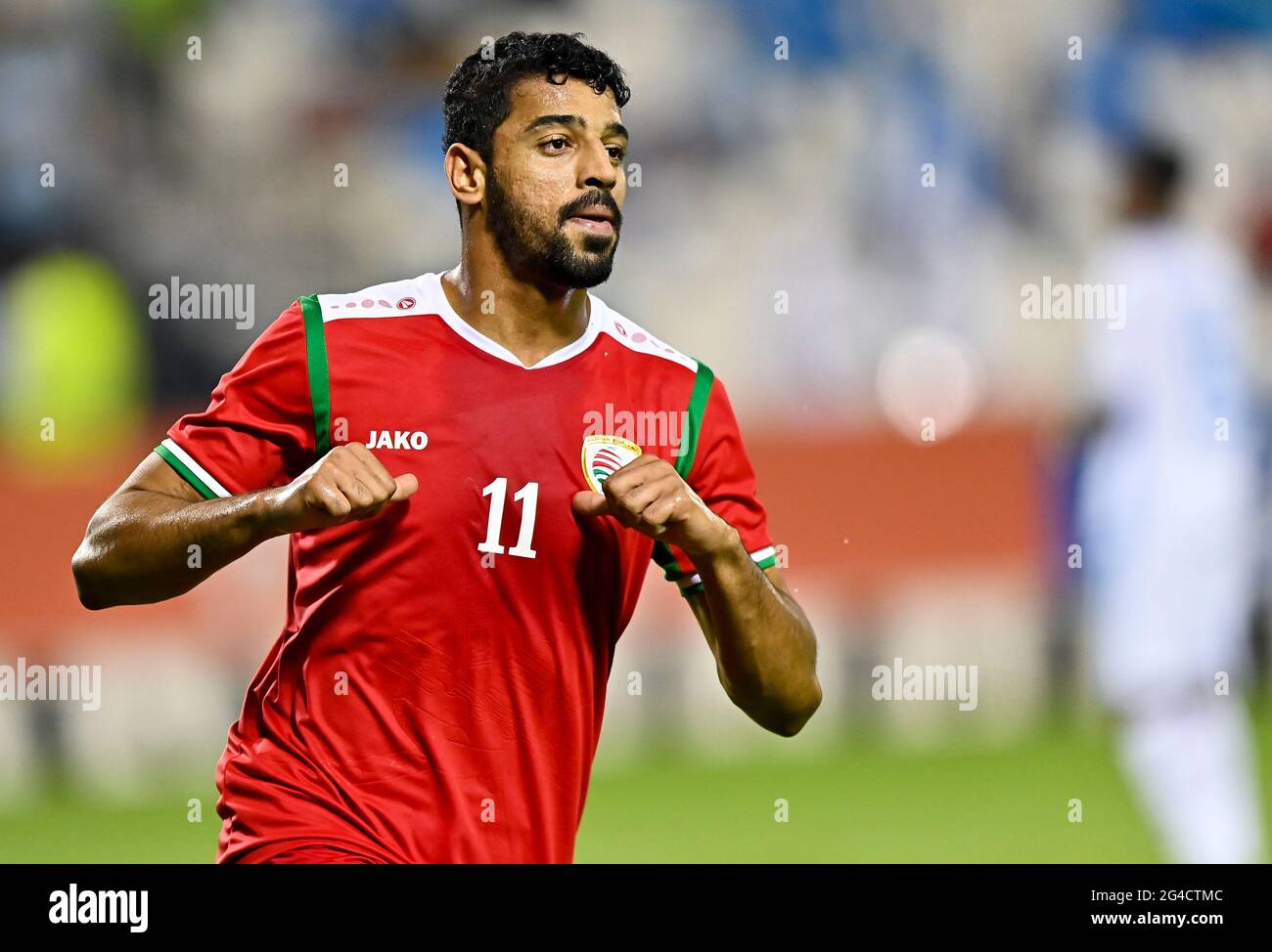 Doha, Qatar. 20 Giugno 2021. Muhsen Saleh al Ghassani di Oman celebra il suo obiettivo durante la Coppa araba FIFA Qatar 2021, partita di football tra Oman e Somalia a Doha, Qatar, 20 giugno 2021. Credit: Nikku/Xinhua/Alamy Live News Foto Stock