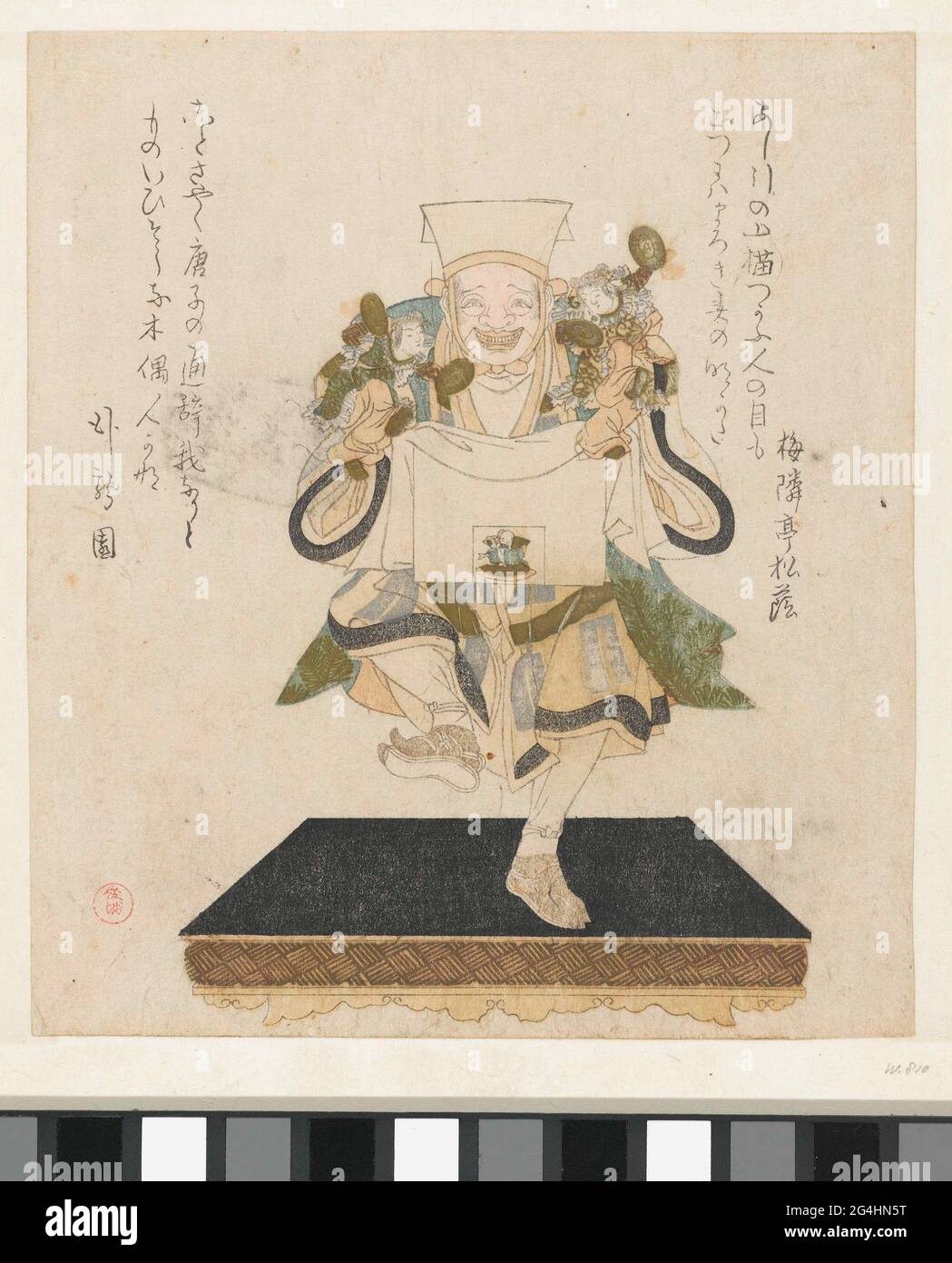 . Una bambola meccanica (Karakuri Ningyô) con occhi e bocca mobili, con due bambole di ragazzi cinesi (Karako) in mano. Questi tipi di bambole erano popolari durante il periodo EDO (1600-1868). Con due poesie. Foto Stock