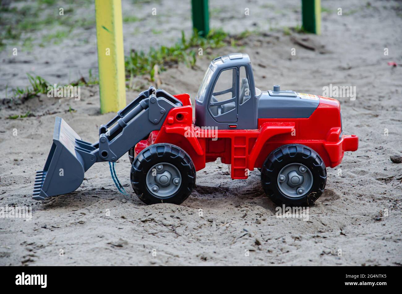 Giocattolo di plastica per bambini nella sandbox Foto Stock