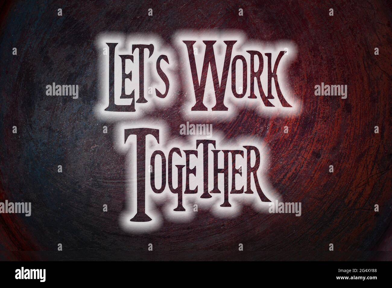 Lavoriamo insieme il testo concettuale sullo sfondo Foto Stock