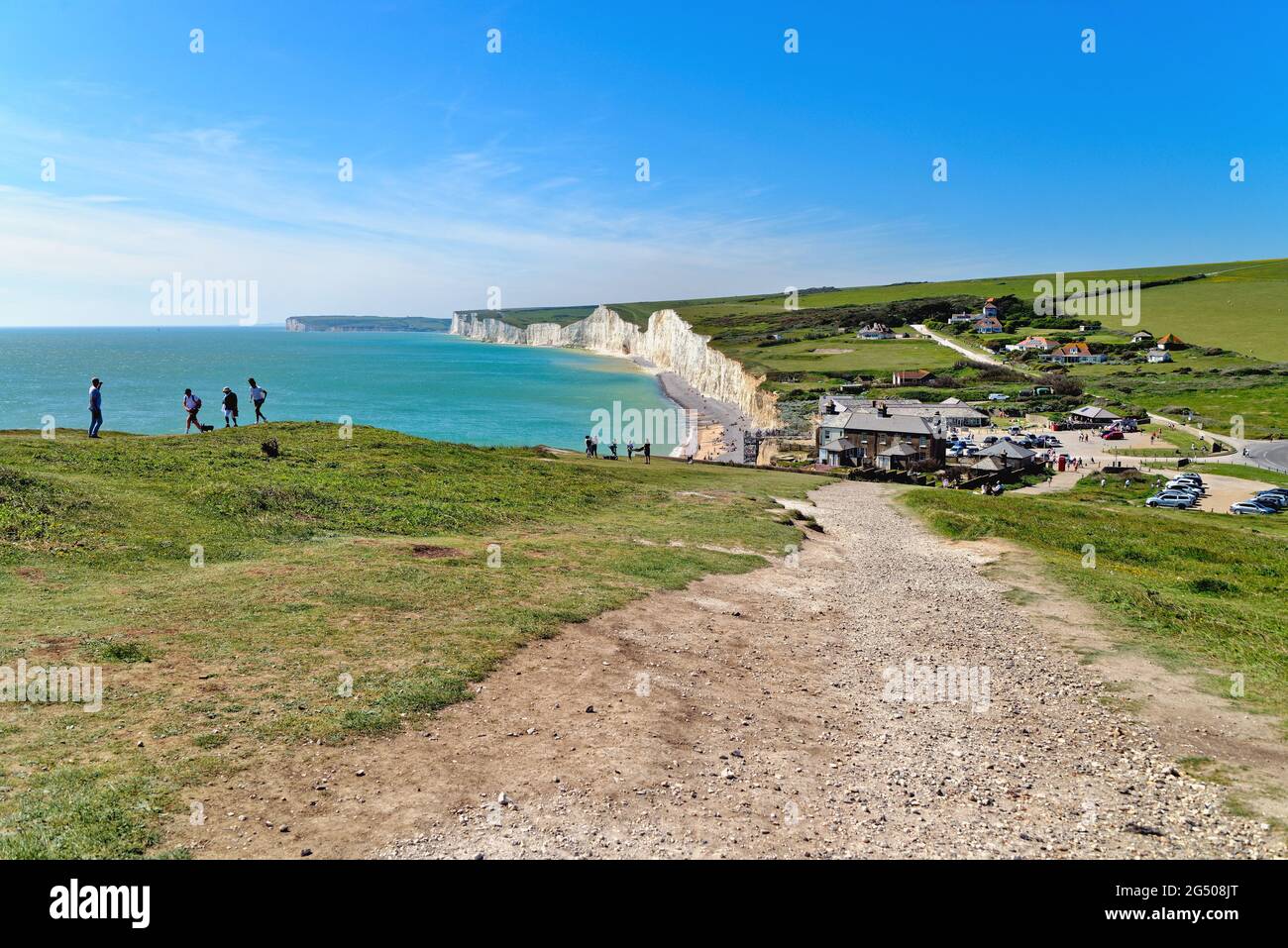 Le scogliere di gesso della costa delle sette Sorelle a Birling Gap, South Downs National Park in una calda giornata di sole estati, Eastbourne East Sussex England Foto Stock