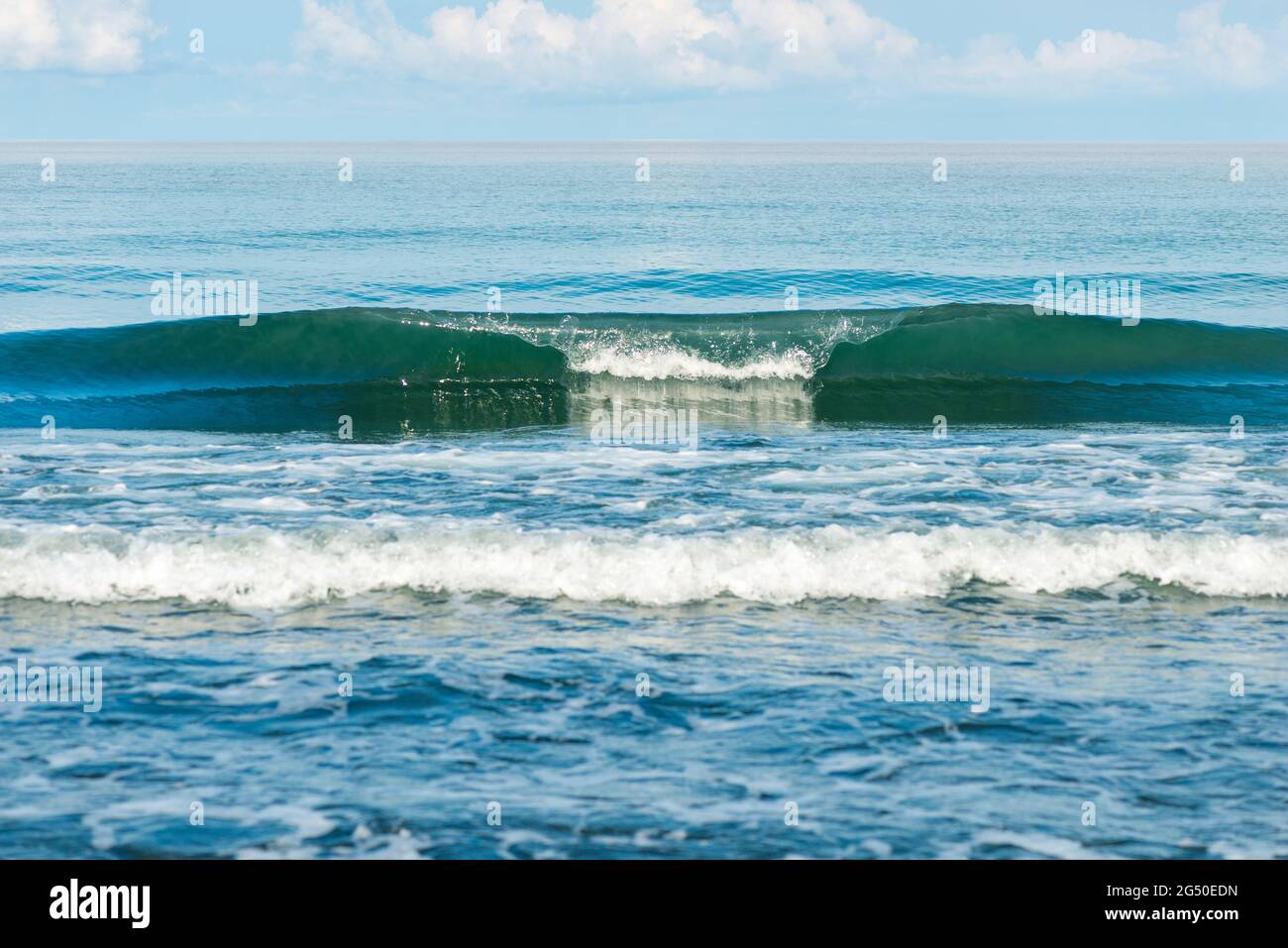 wave splash mare spiaggia macro, primo piano Foto Stock