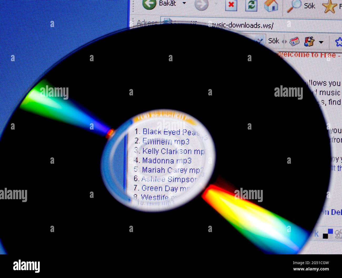 Qualcuno per scaricare file musicali su Internet, condivisione di file musicali. Foto Stock