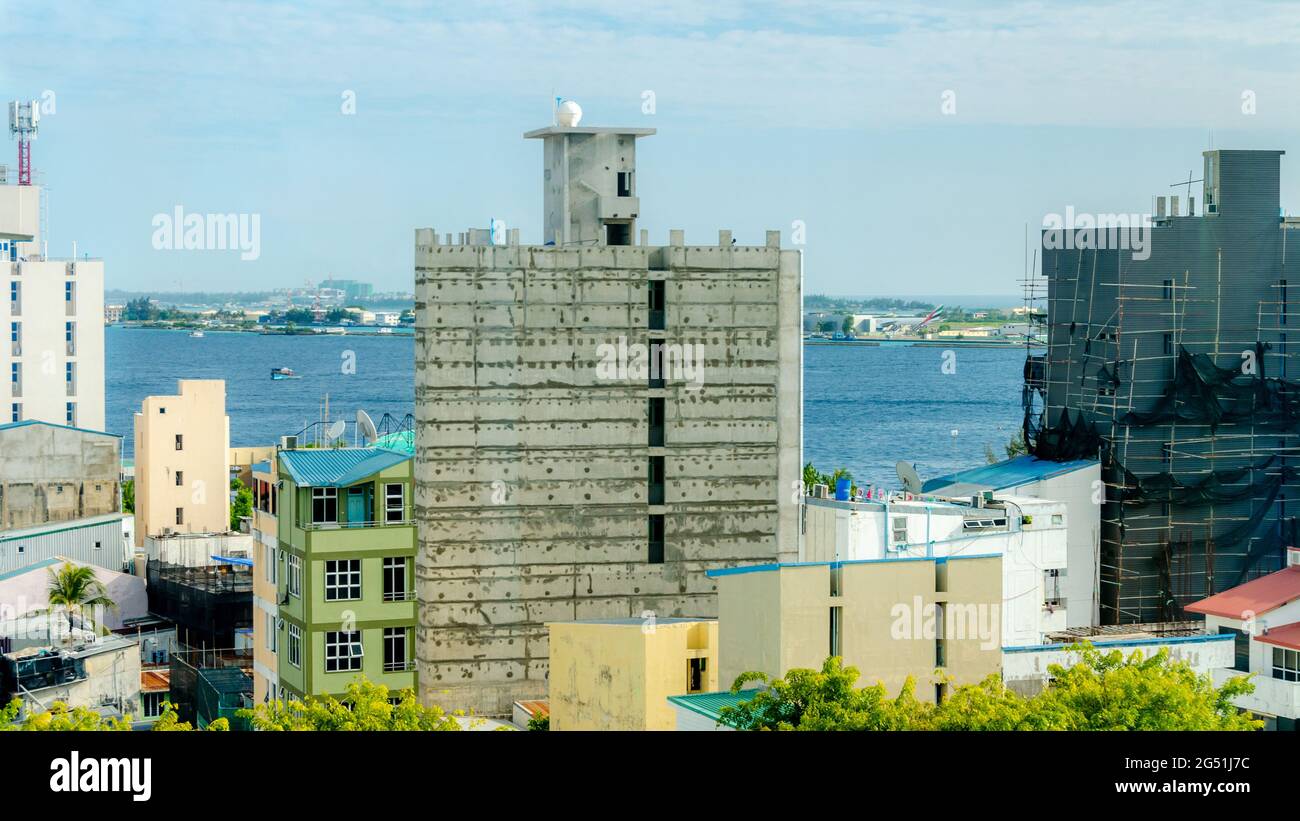 Alto edificio in costruzione a Malé, la capitale delle Maldive Foto Stock