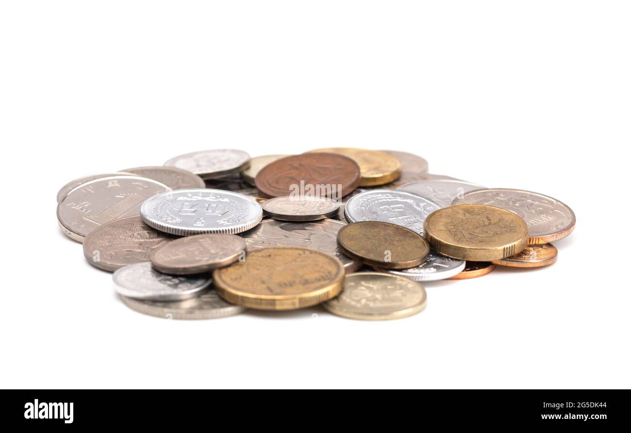 Un mix di monete provenienti da vari paesi Foto Stock