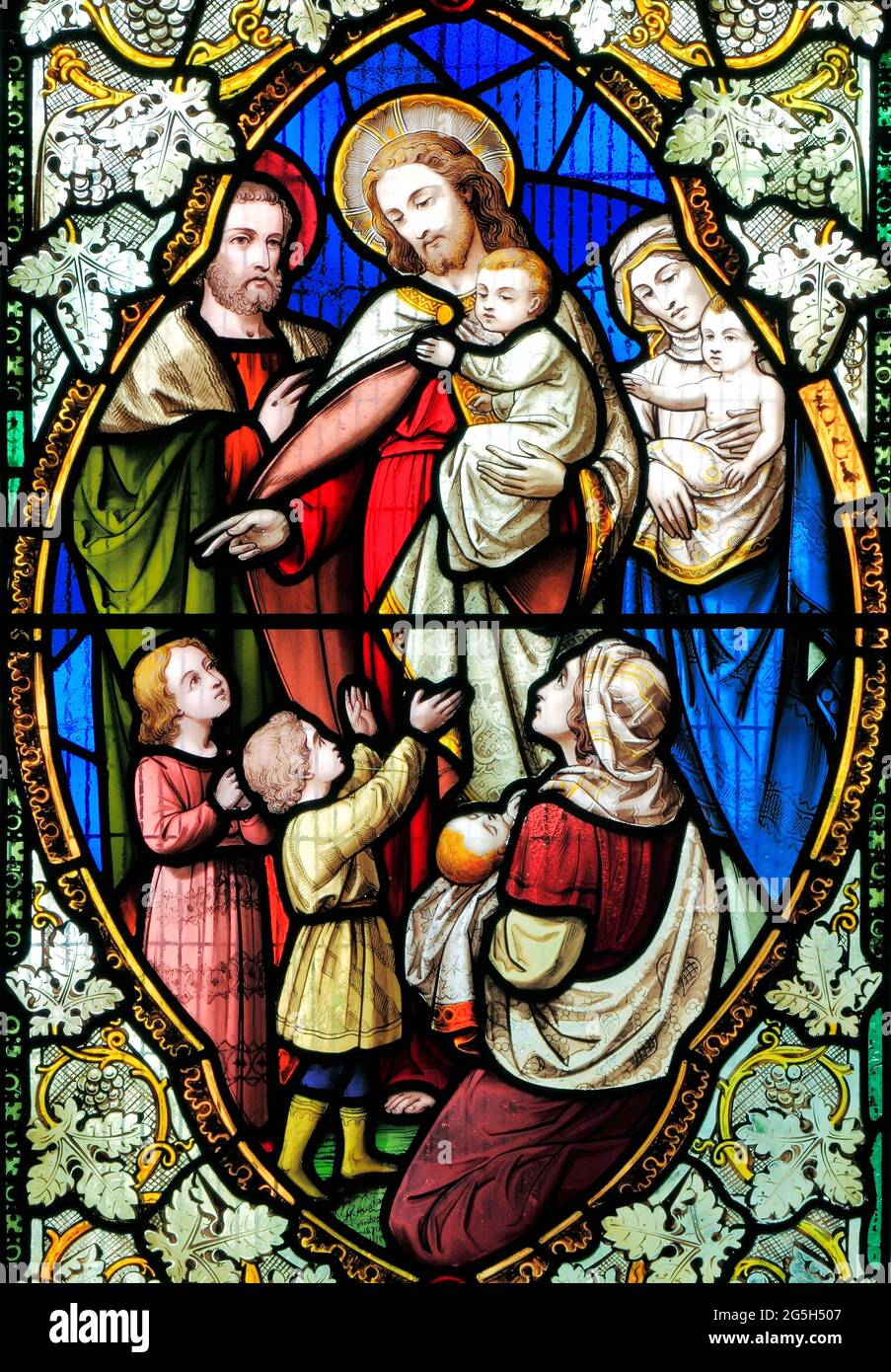 Soffrite i bambini piccoli, benedizione di Gesù, vetrate colorate, di Ward & Hughes, 1869, Stanhoe, Norfolk, Inghilterra Foto Stock