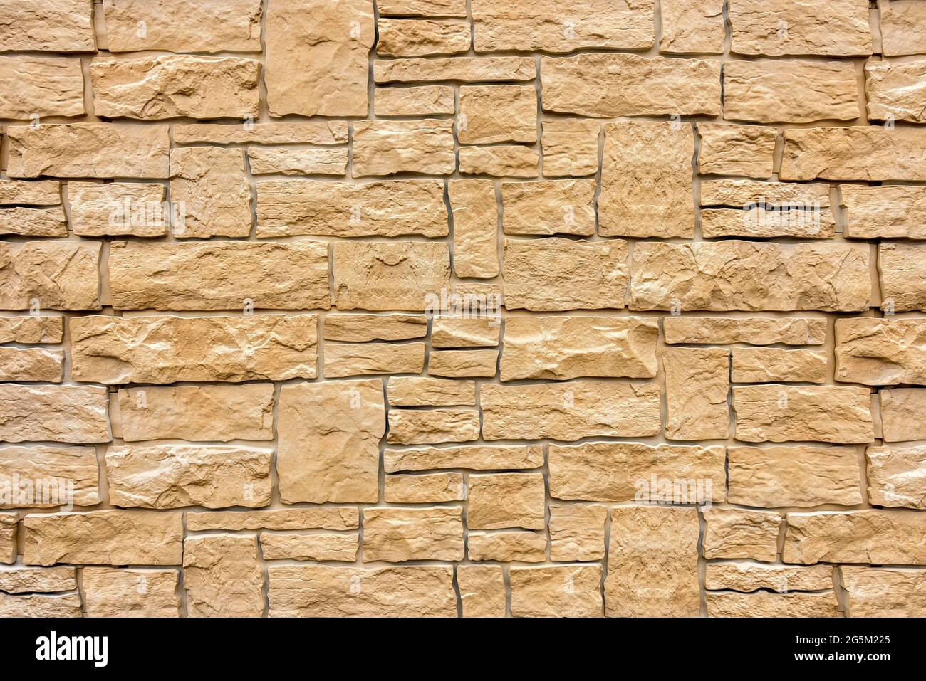 Muro di pietra artificiale, imitazione di pietra naturale da plastica, carta da parati Foto Stock