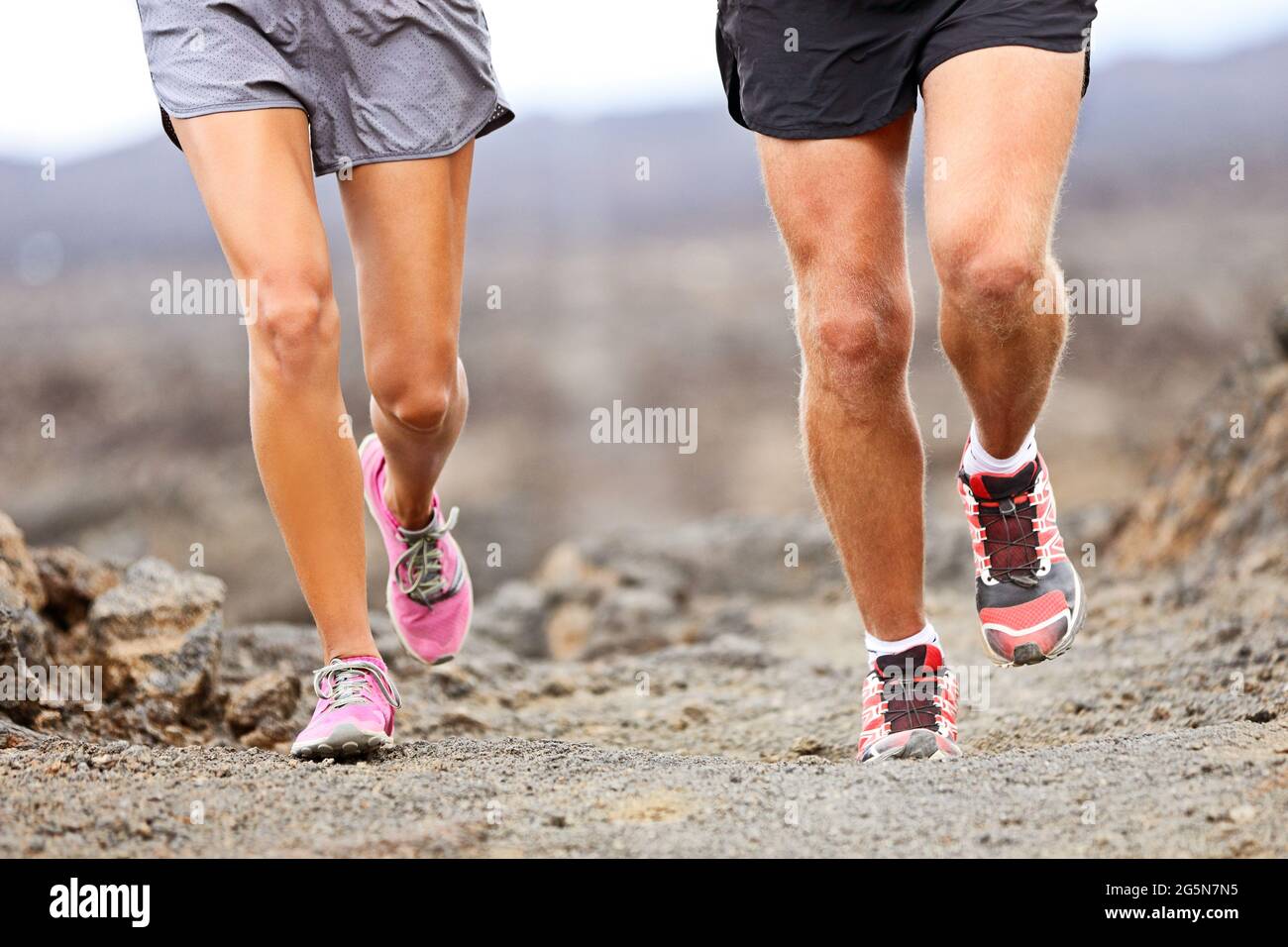 Scarpe da running Runner su pista Foto Stock
