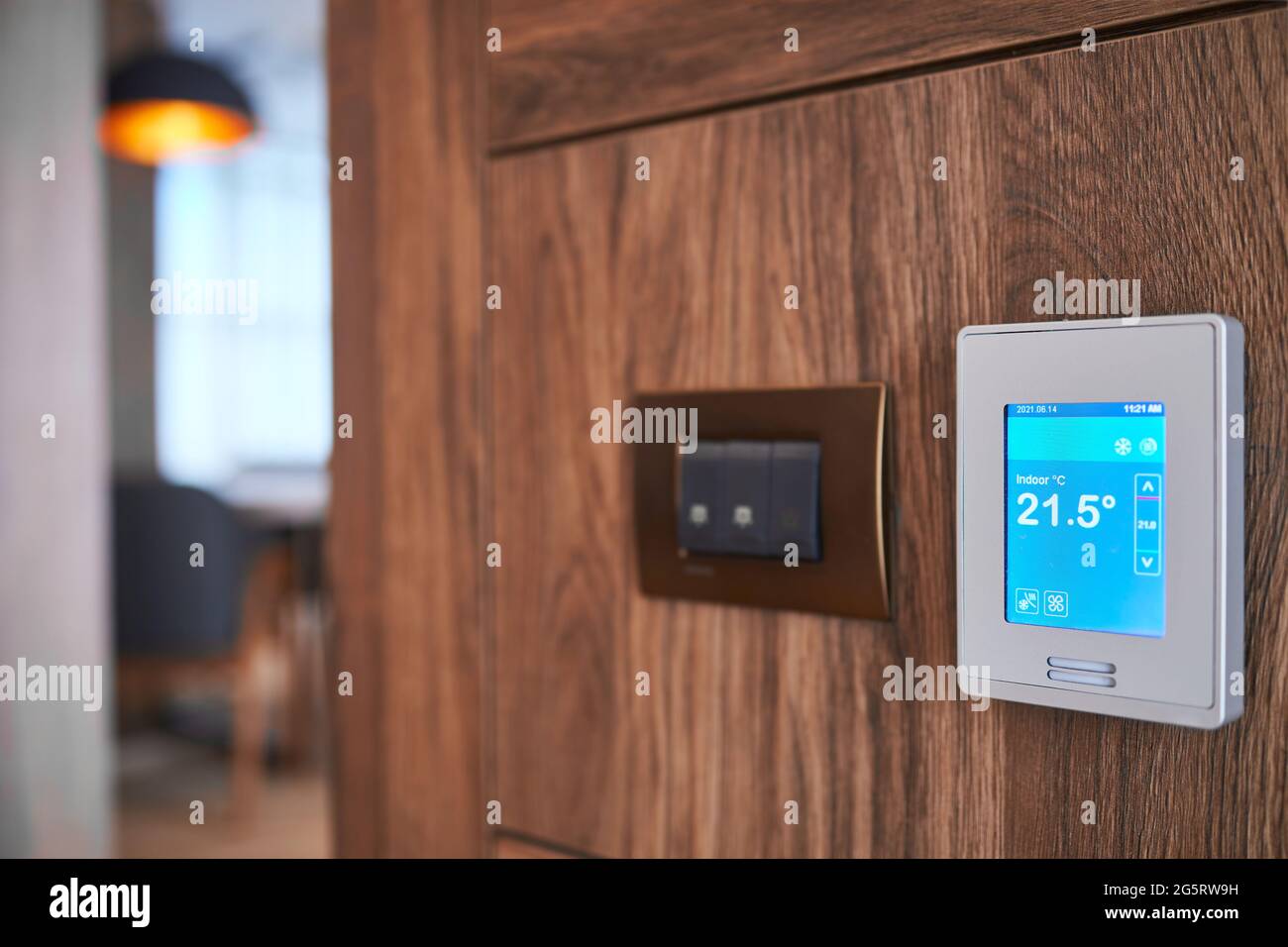 Pannello touch screen dell'impianto di climatizzazione della stanza Foto Stock