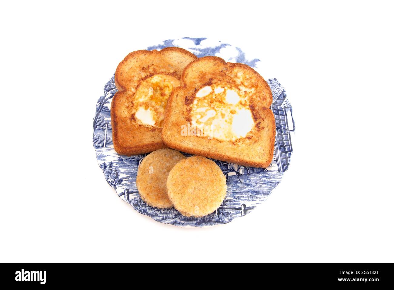 Uova fritte nel centro di toast per colazione Foto Stock