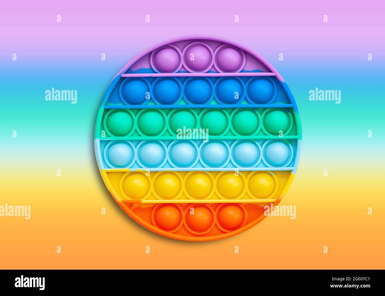 Il popolare giocattolo anti-stress in silicone multicolore lo schioccano. Colorato anti stress sensoriale gioco fidget push pop IT. Foto Stock