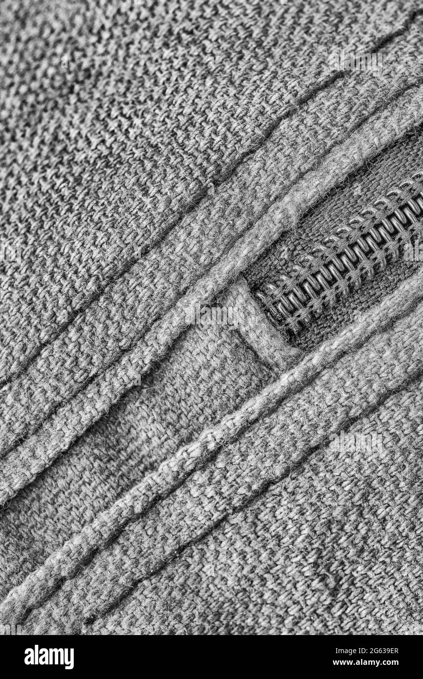 Immagine macro in primo piano astratta in bianco e nero di cuciture per impieghi pesanti / punti di articoli in tela. Per cucire in idioma di tempo, ben sicuro, abilità all'aperto. Foto Stock