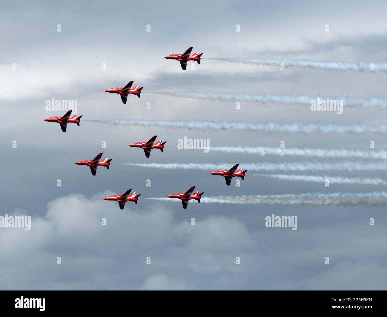 Le frecce rosse sono il team di formazione leader mondiale della RAF. Volano regolarmente in esposizione pubblica intorno al Regno Unito ed al mondo. Foto Stock