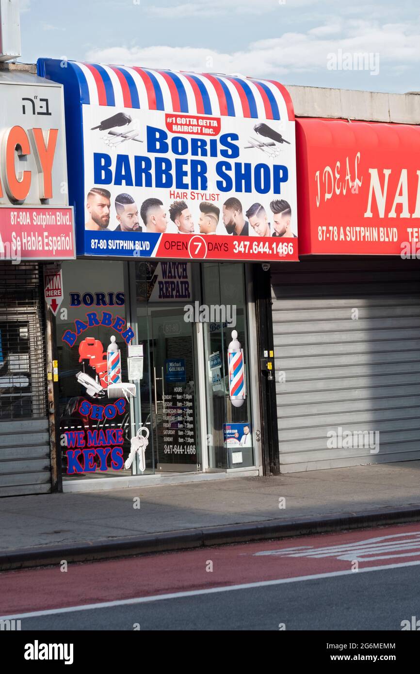L'esterno del Boris Barber Shop su Sutphin Boulevard in Giamaica, Queens, New York City Foto Stock