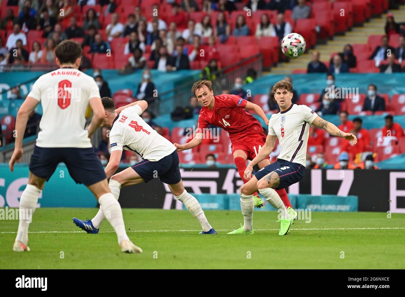 Goalchance Daenemark da sinistra a destra Harry MAGUIRE (ENG), Declan RICE (ENG), Mikkel DAMSGAARD (DEN) e John STONES (ENG) azione, duelli, semifinali, gioco M50, Inghilterra (ENG) - Danimarca (DEN) su 07.07.2021 a London/Wembley Stadium. Football EM 2020 dal 06/11/2021 al 07/11/2021. ÃÂ Foto Stock