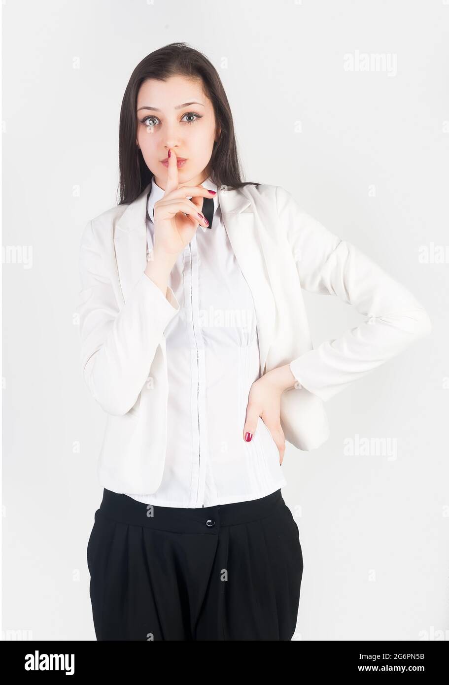 Donna che gesturing al silenzio Foto Stock