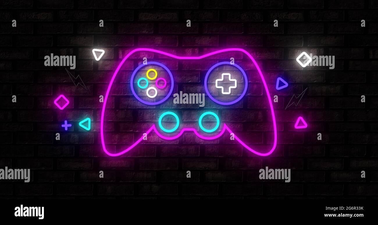 Icone di gioco al neon su sfondo nero 4k Foto Stock