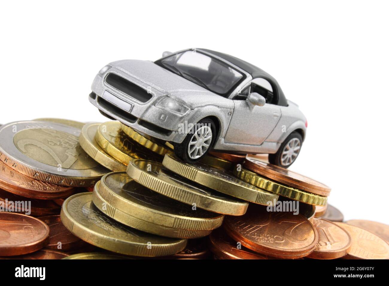 Auto su Euro Coin Mountain Foto Stock