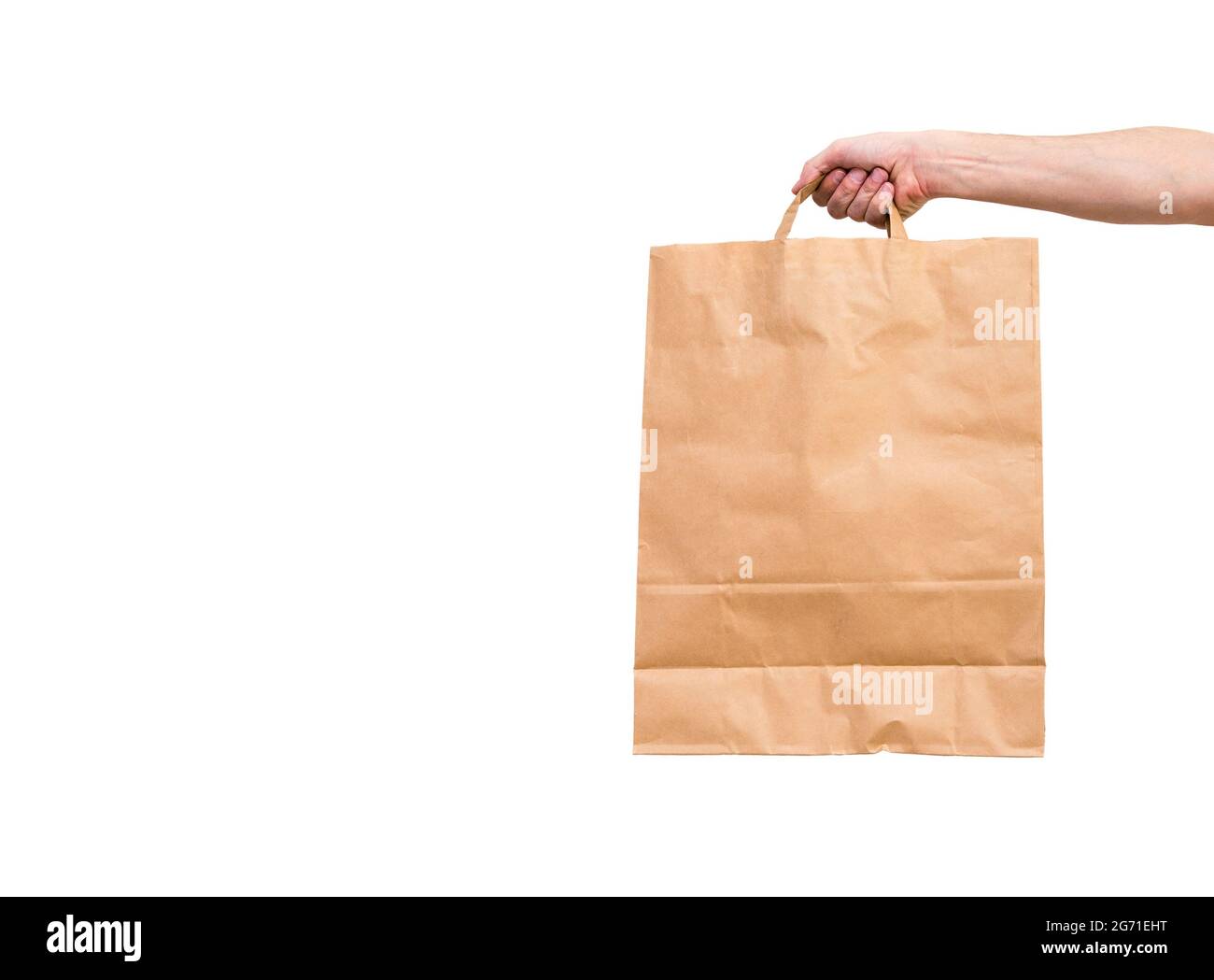 Concetto di consegna a domicilio sicura in una pandemia. Coronavirus 2019-nCov protezione. Mano del corriere con spazio per la copia. Foto Stock