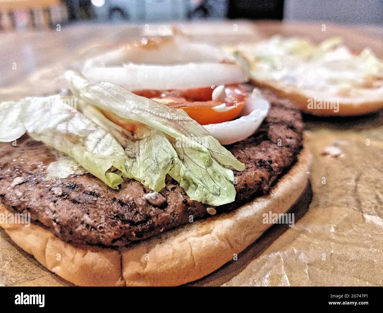 Hamburger Patty Tomato Bun e lattuga Foto Stock