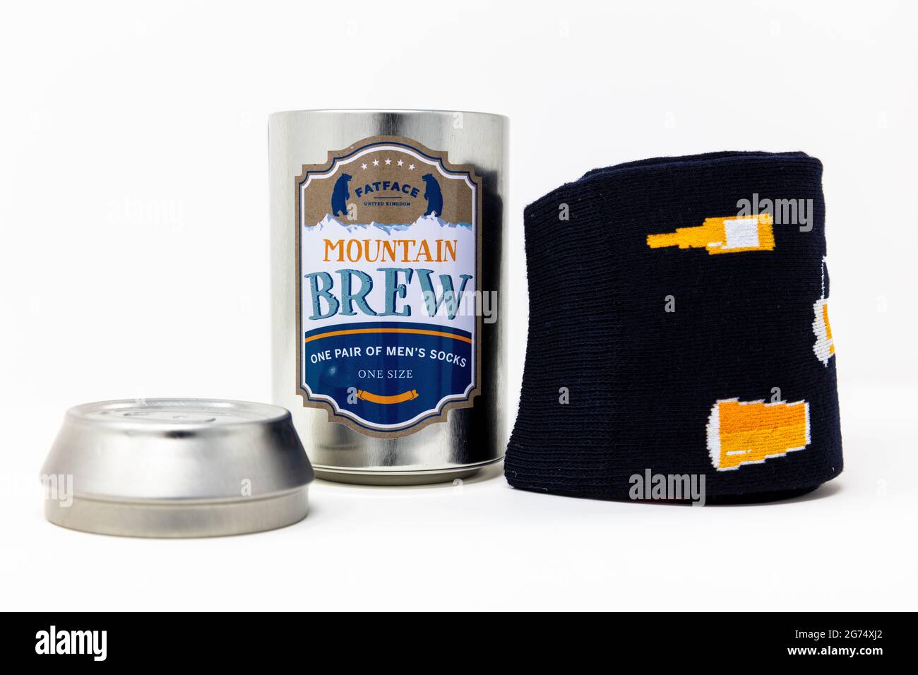 Fatface Mountain Brew calze in un regalo lattina Foto Stock