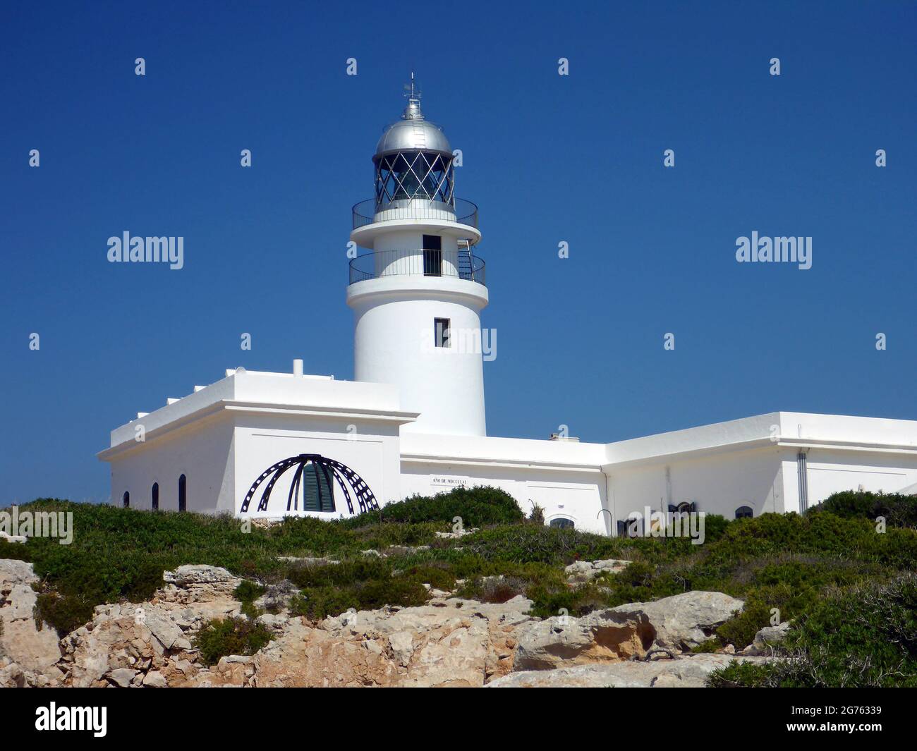 Faro de SA Cavalleria, Minorca, Isole Baleari Foto Stock