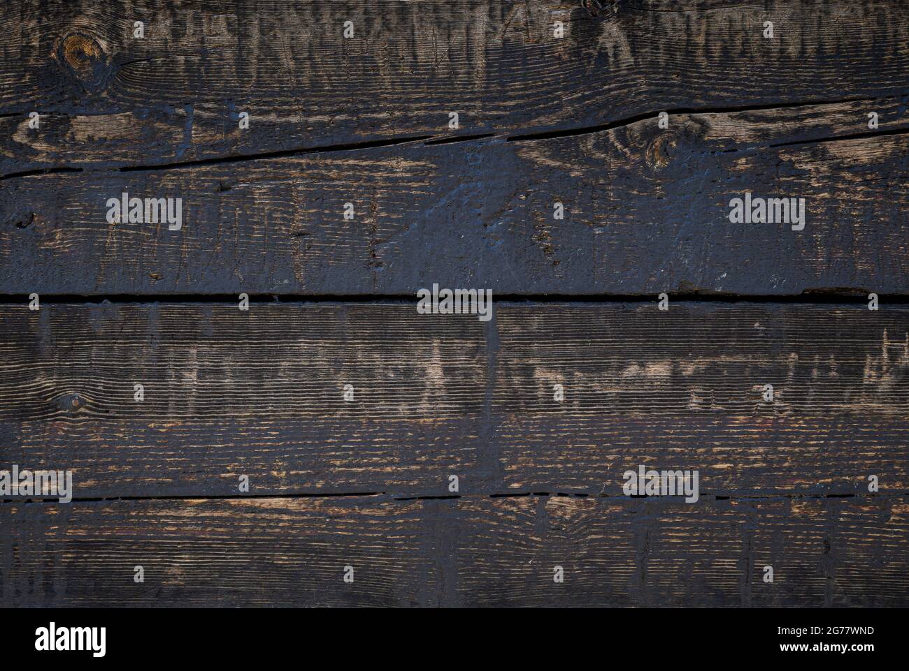 Primo piano di due vecchie tavole di legno stagionate e invecchiate. Sfondo con texture a frame completo astratto. Foto Stock