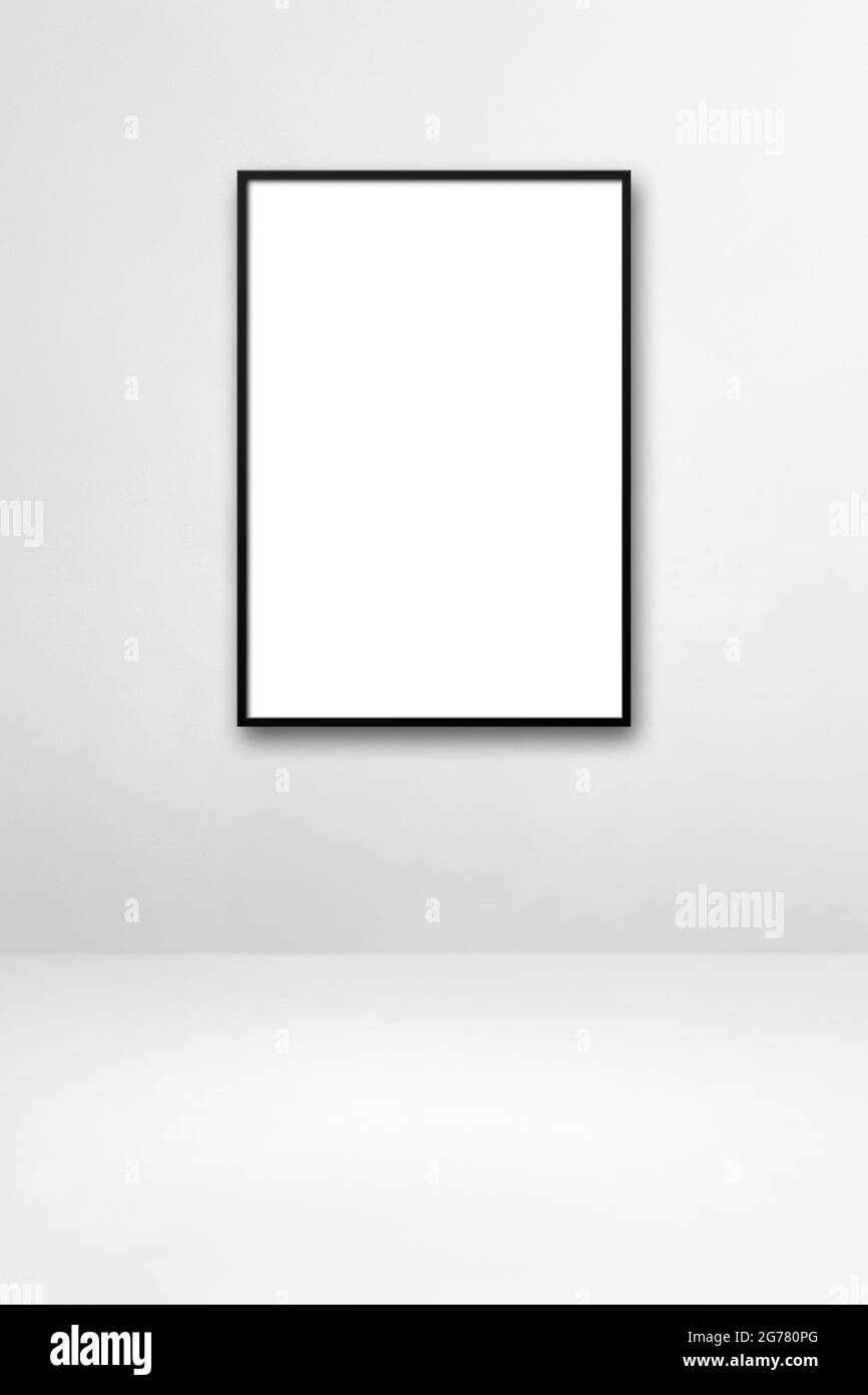 Cornice nera appesa a una parete bianca. Modello di mockup vuoto Foto Stock