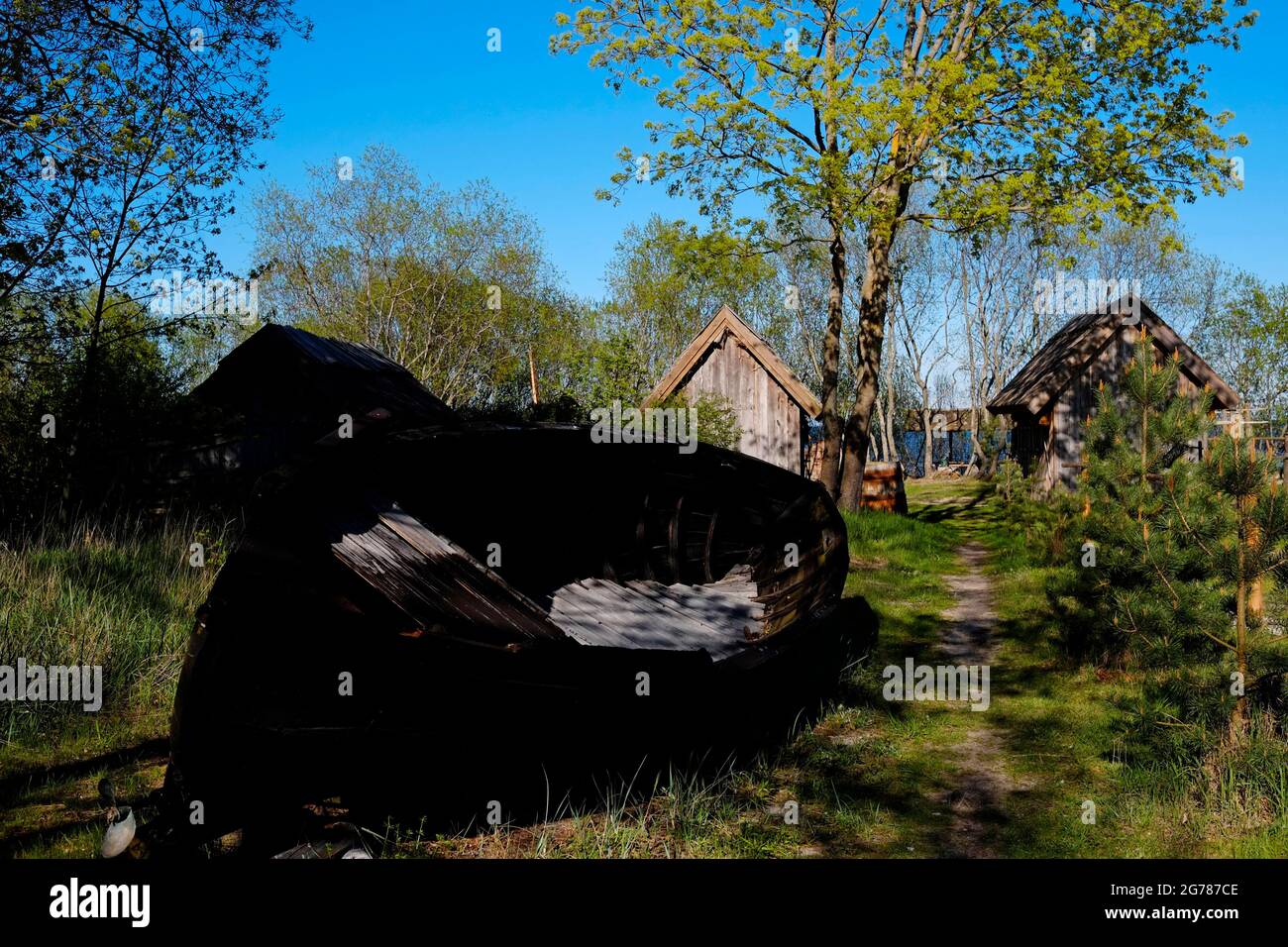 Capanne di legno al Museo all'aperto di Ragakapa, che raffigura la vita quotidiana dei pescatori all'inizio del XX secolo, situato ai piedi della duna Ragakapa, vicino a Jurmala, una città turistica lettone sul Golfo di riga, sulla costa del Mar Baltico, Repubblica di Lettonia Foto Stock