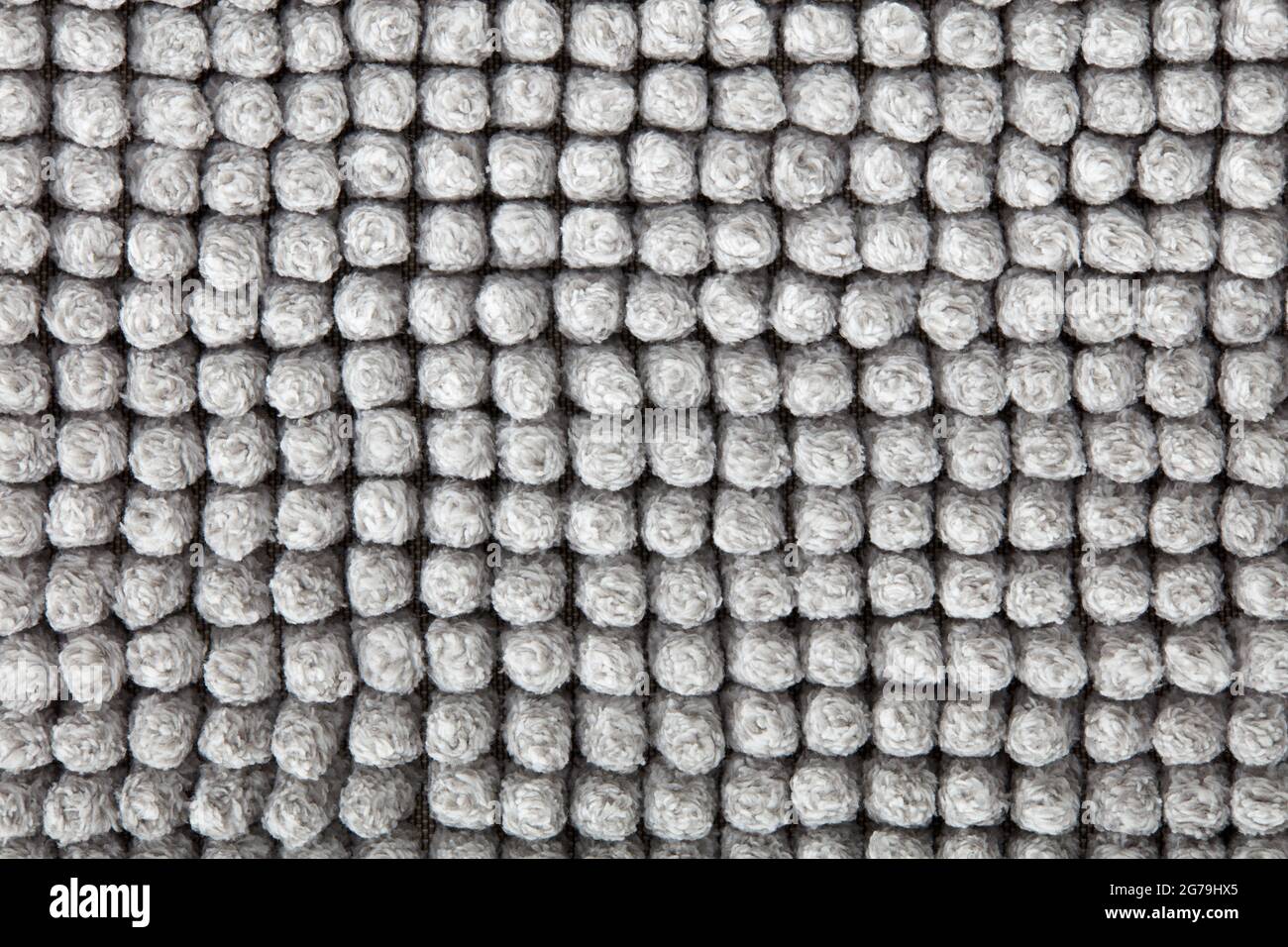 Fondo grigio tessuto tappeto bagno chenille Foto Stock