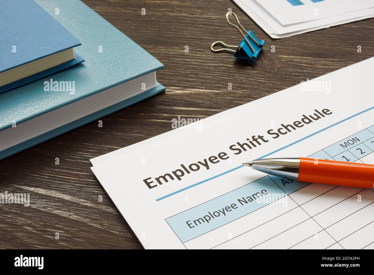 Programma di turno dei dipendenti per lavoro e penna. Foto Stock