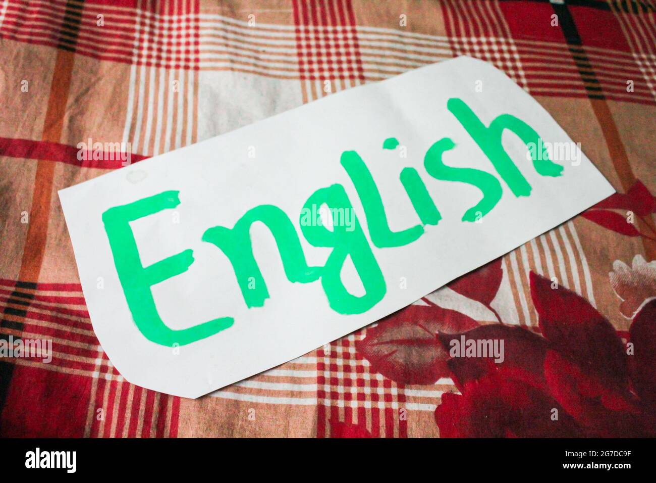 Parola inglese scritta su white paper Foto Stock
