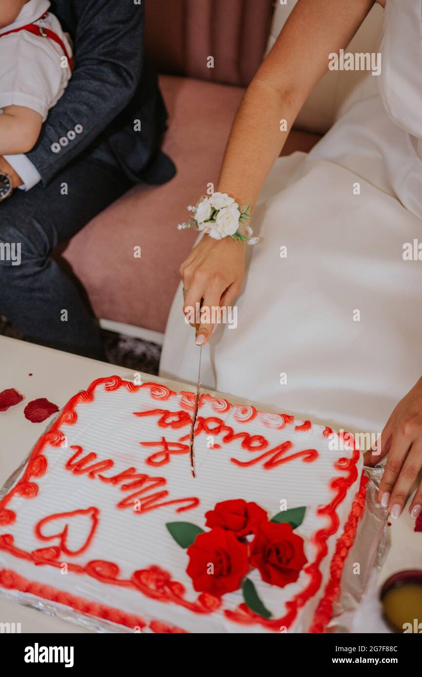 torta nuziale con candele Foto Stock