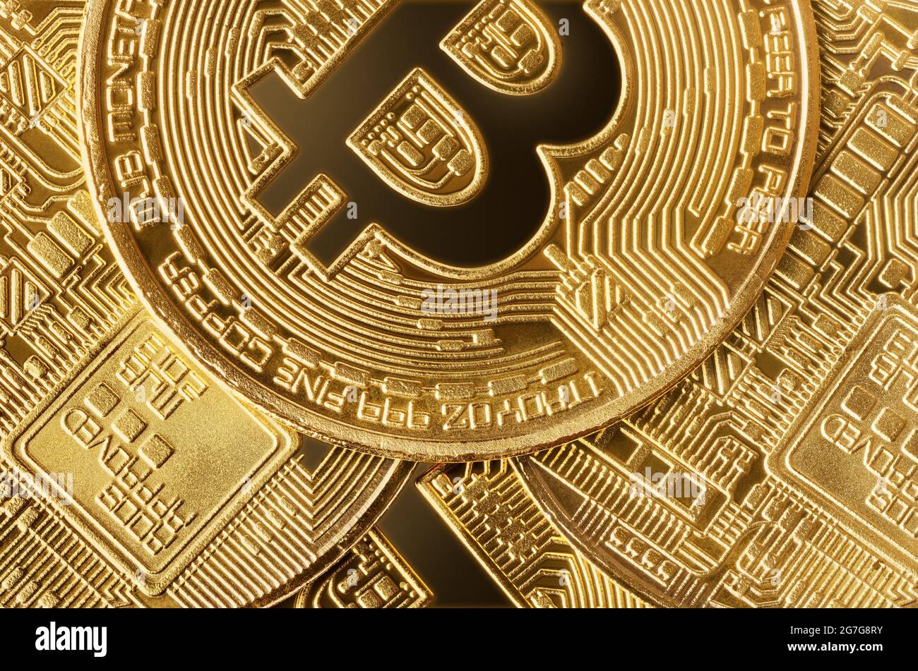 Sfondi e texture: Gruppo di monete di bitcoin d'oro, primo piano Foto Stock