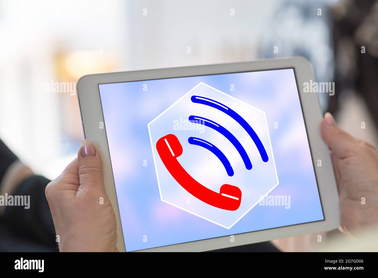 Schermo del tablet che visualizza un concetto di hotline Foto Stock