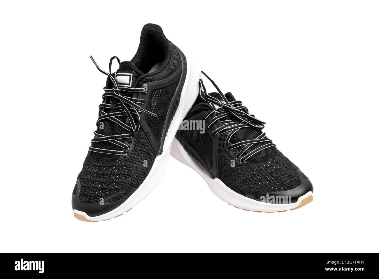 Scarpe sportive, moderne scarpe sportive nere isolate su sfondo bianco. Foto Stock