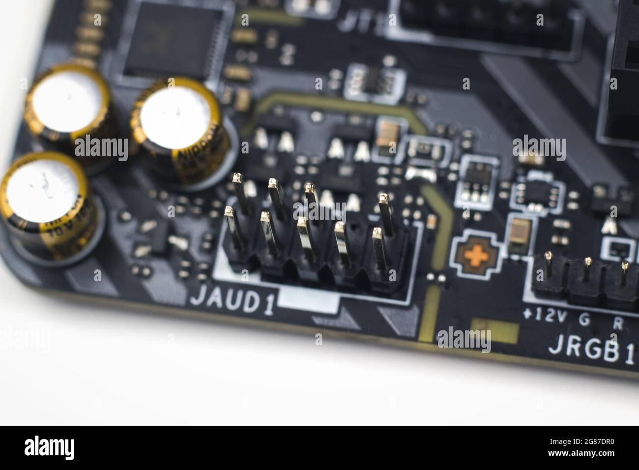 Componente di ingegneria delle informazioni. Parte della moderna scheda madre per computer a circuito stampato Foto Stock