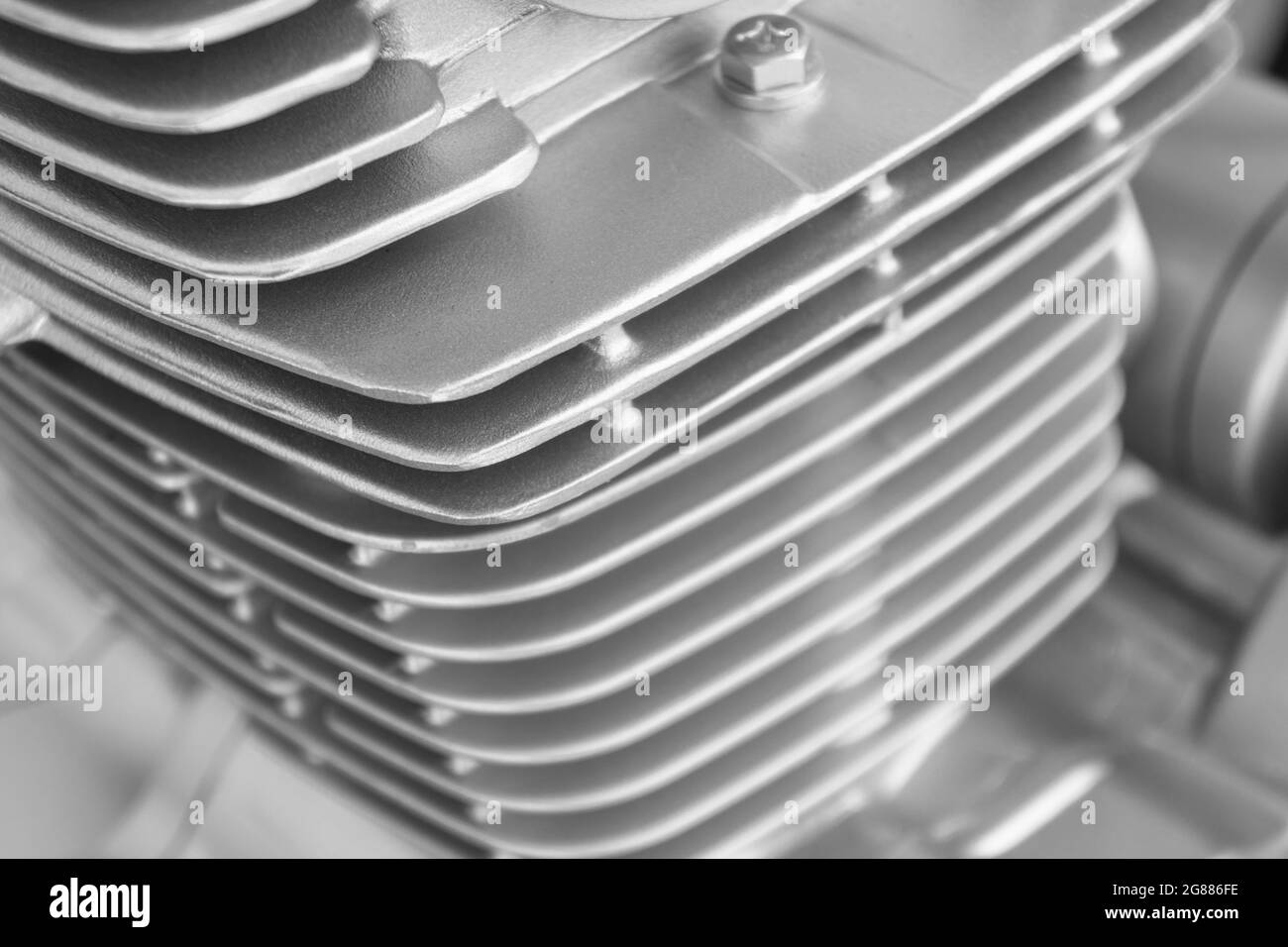 Sfondo del motore per motociclette. Motore a combustione interna raffreddato ad aria per moto, motoslitta o ATV. Primo piano del motore Silver. Foto Stock