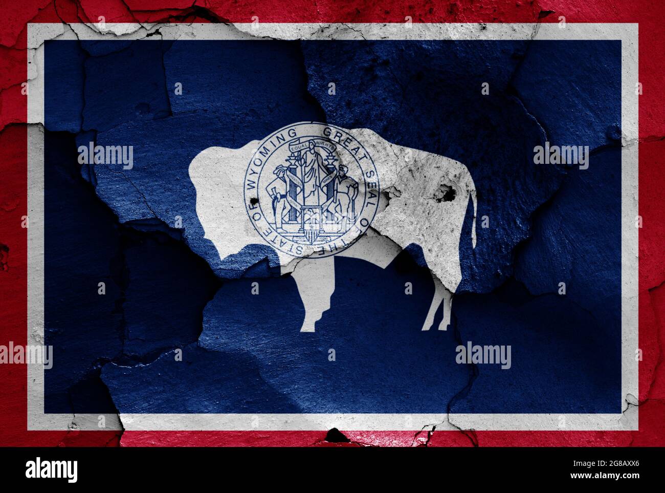 Bandiera del Wyoming, USA dipinta su pareti incrinate Foto Stock