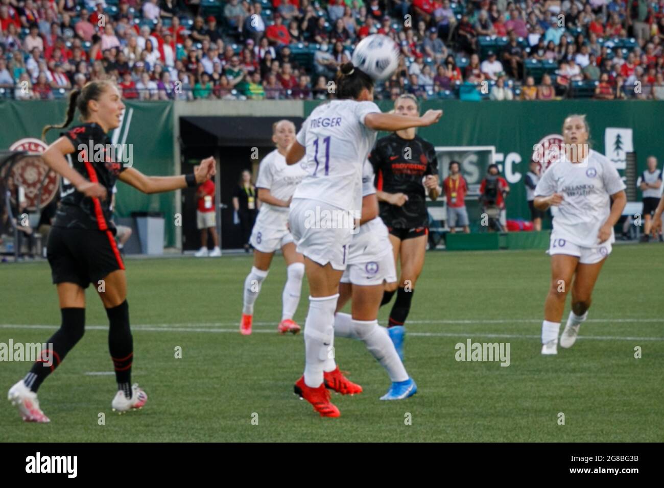 Portland, Stati Uniti. 18 luglio 2021. Ali Krieger di Orlando (11) dirige una palla, mentre il Portland Thorns FC sconfigge l'Orlando Pride, 2-1, il 18 luglio 2021, a Providence Park, Portland, Oregon (Foto di John Rudoff/Sipa USA) Credit: Sipa USA/Alamy Live News Foto Stock