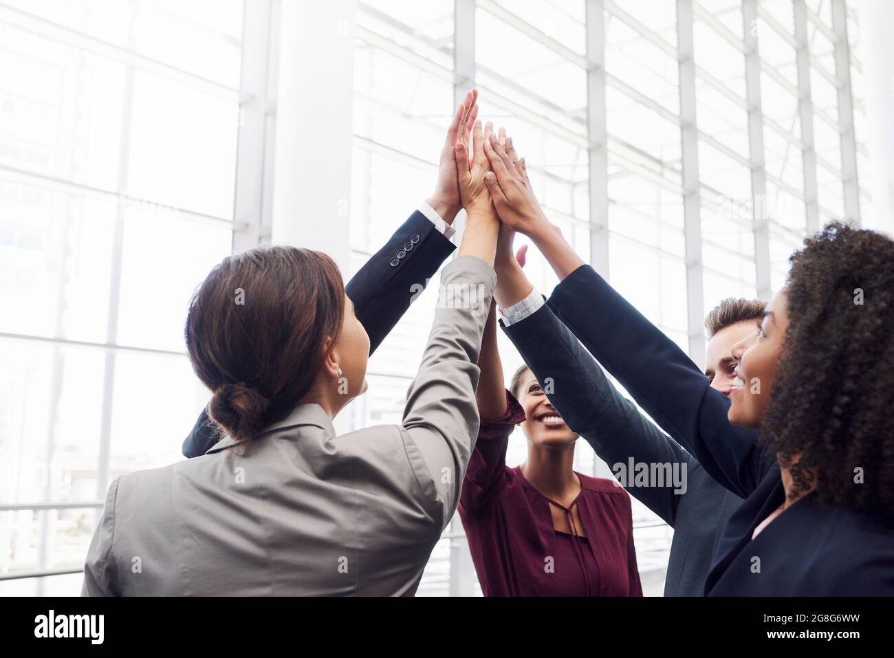 Perché molte mani fanno funzionare la luce Foto Stock
