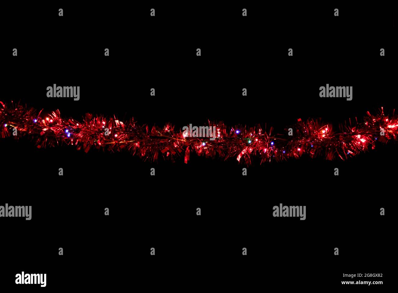 Natale, Capodanno nastro rosso. Spie lampeggianti. Eccellente risorsa grafica. Utilizzare la modalità DI trasferimento DELLO SCHERMO per rendere il nero trasparente Foto Stock