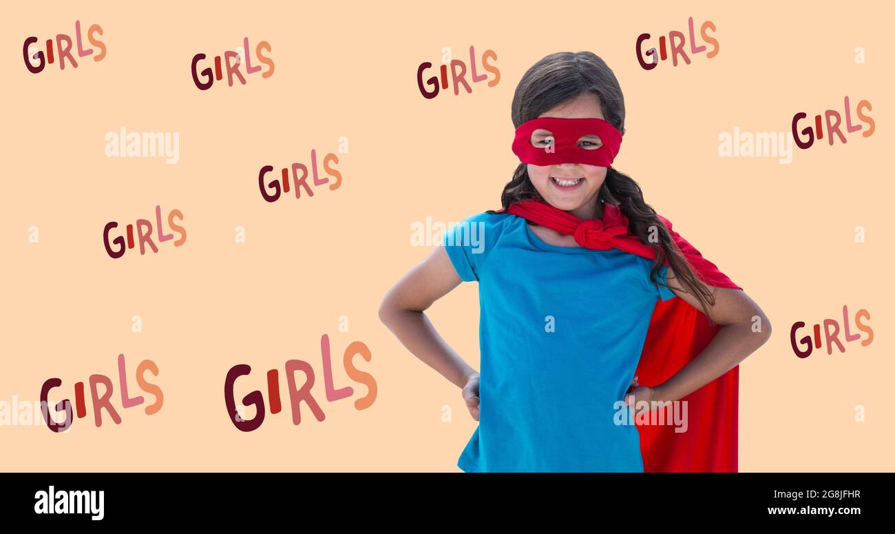 Composizione di testo ragazze su ragazza in costume supereroe Foto Stock