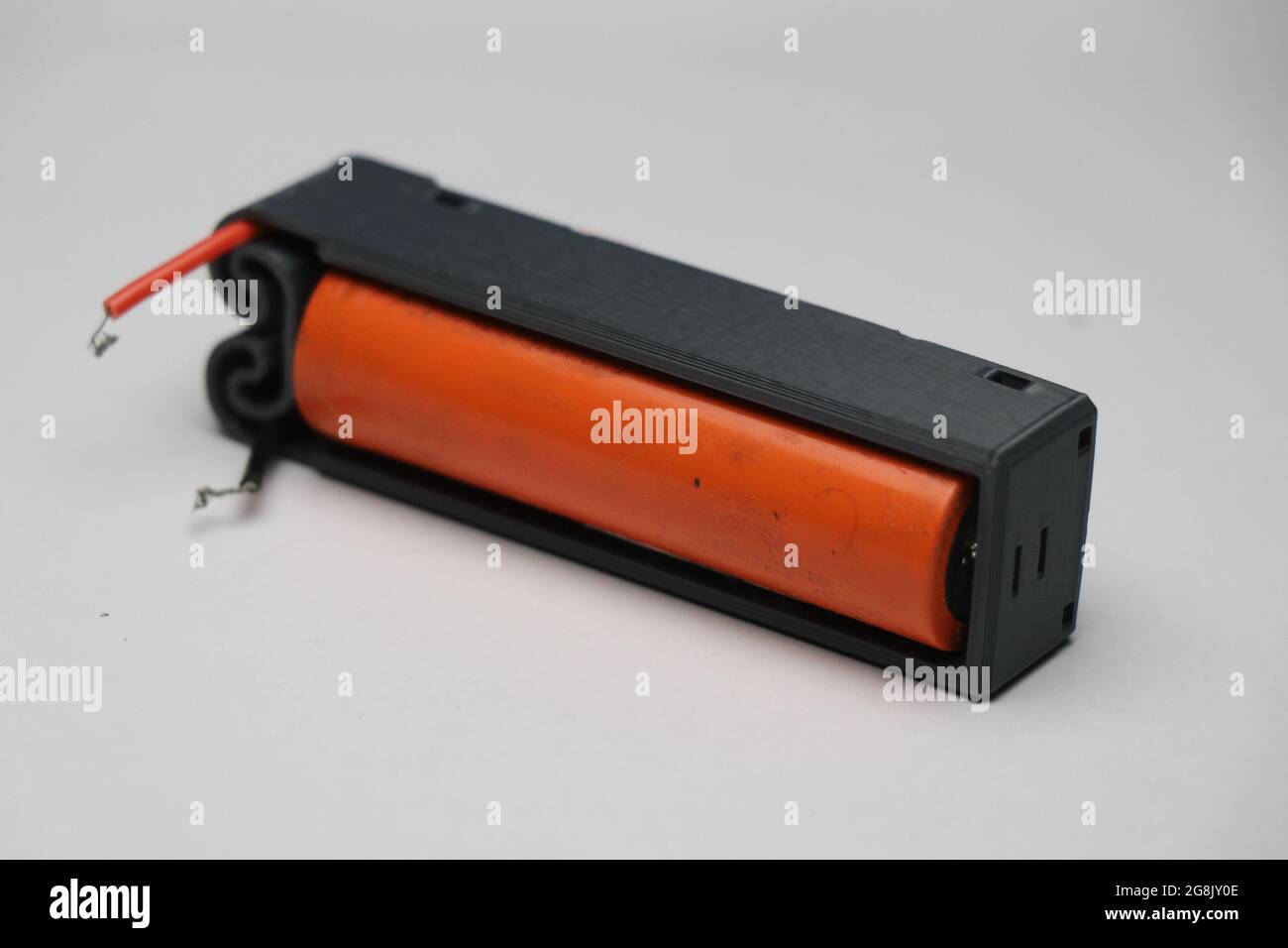 Agli ioni di litio, tipo di batteria ricaricabile collegata al relativo supporto Foto Stock