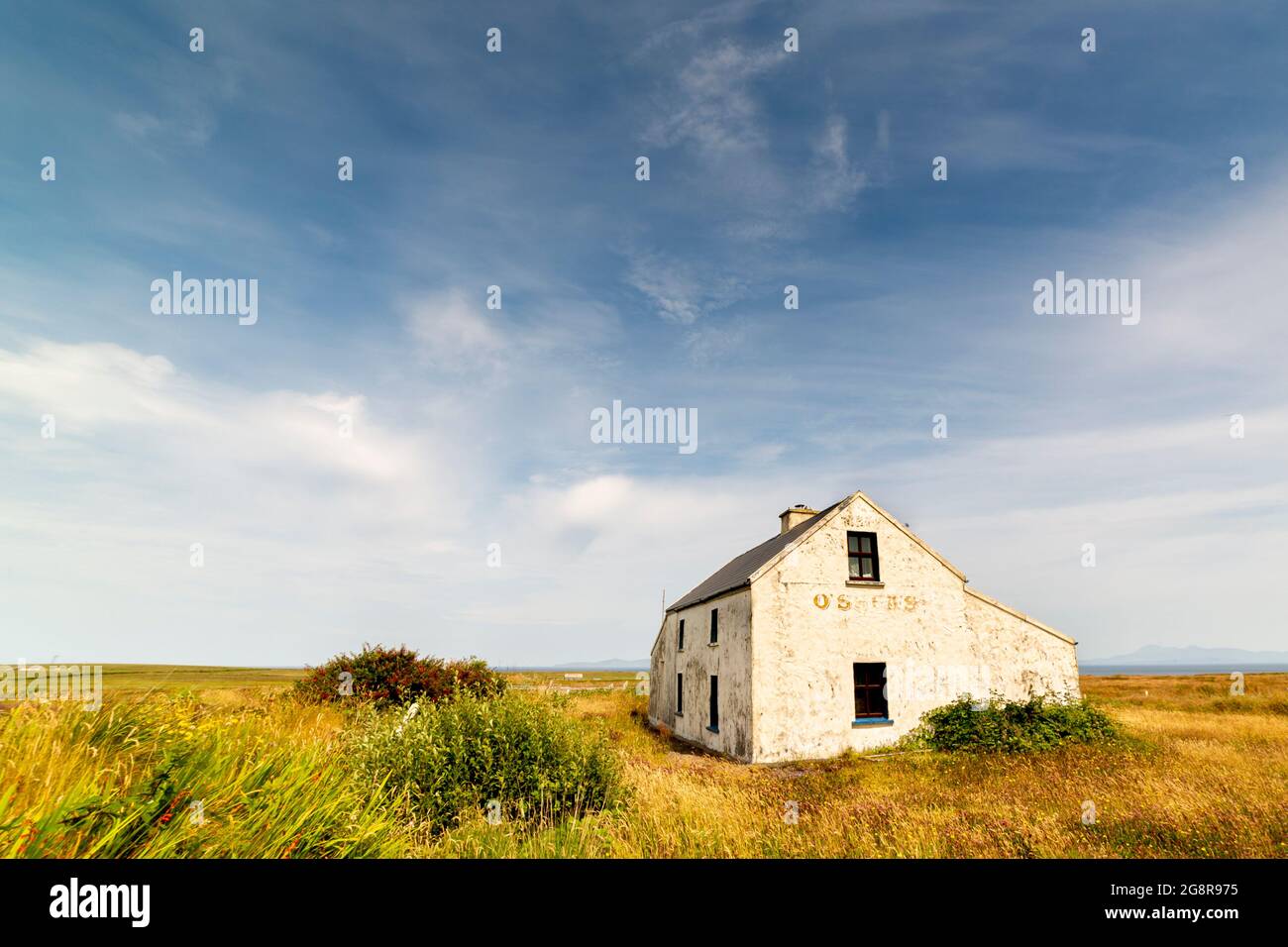 Casa isolata sull'isola di Valentia, Contea di Kerry, o'Sheas utilizzato in Guinness pubblicità Foto Stock