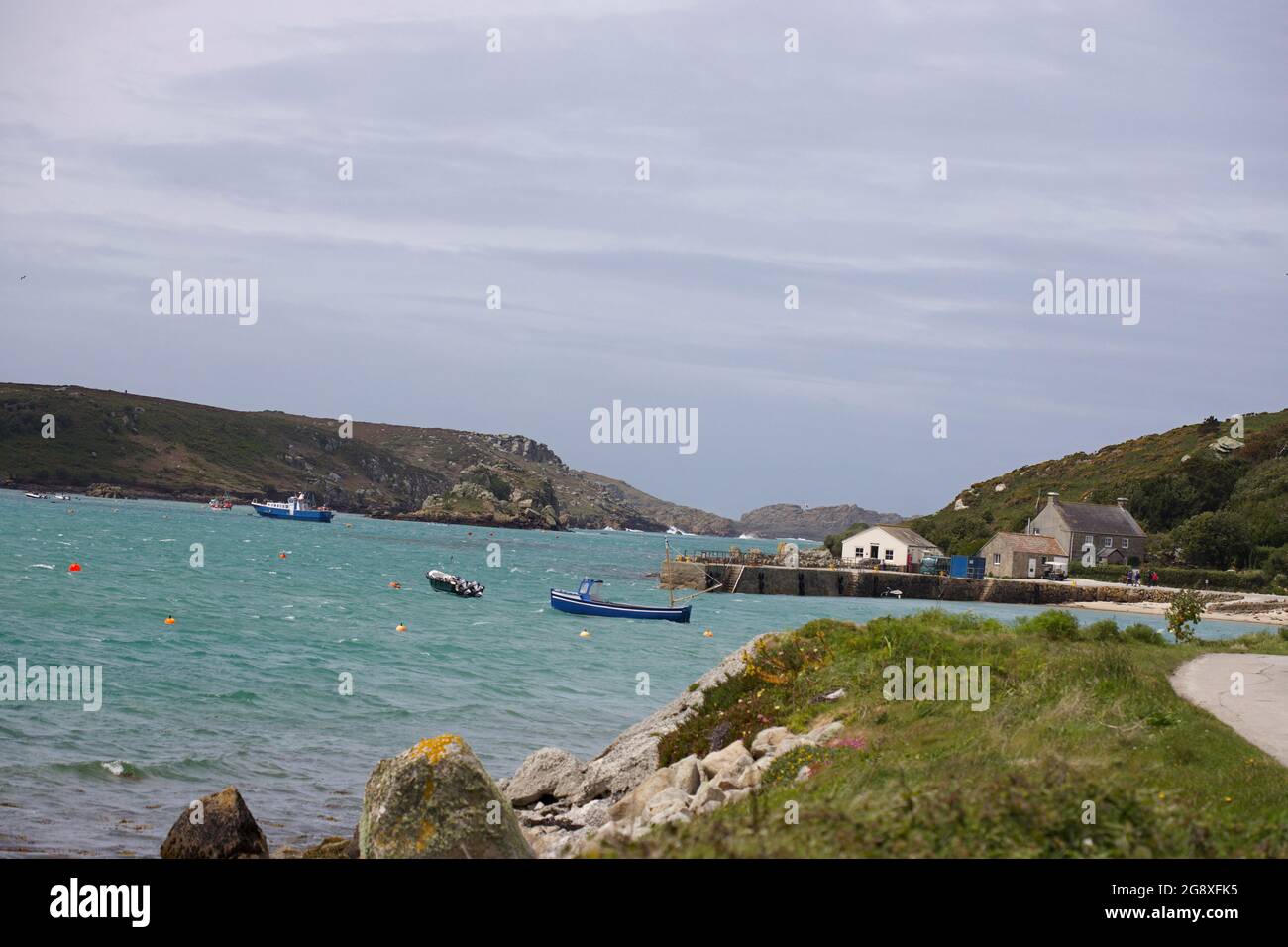 Quayside a New Grimsby, Tresco, Isole di Scilly a High Tide Foto Stock