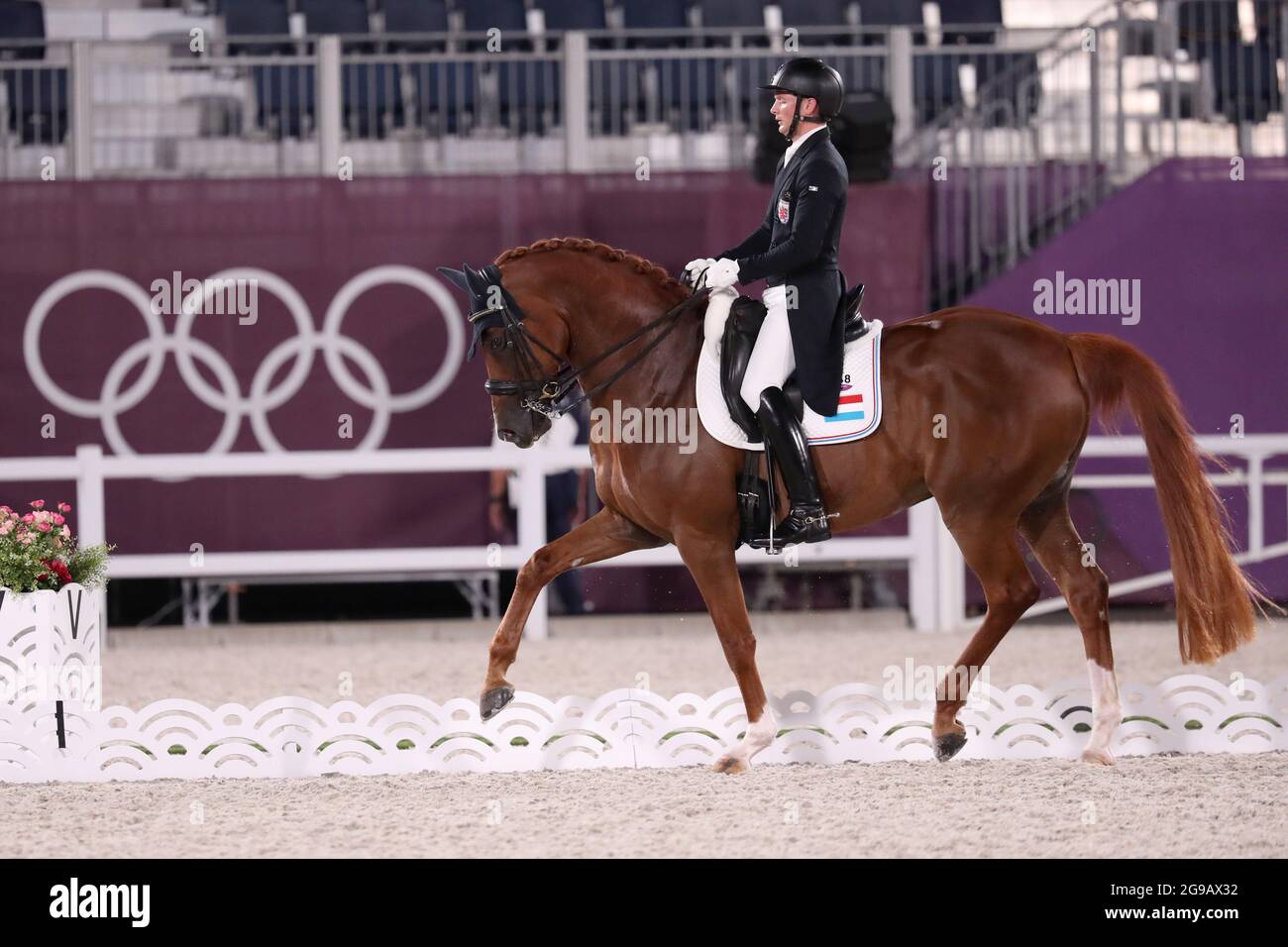 Tokio, Giappone. 25 luglio 2021. Equitazione Sport/Dressage: Olympia, Concorso preliminare, individuale, Gran Premio, Parco equestre Baji Koen. Nicolas Wagner Ehlinger dal Lussemburgo corre il cavallo Quater Indietro Junior FRH. Credit: Friso Gentsch/dpa/Alamy Live News Foto Stock